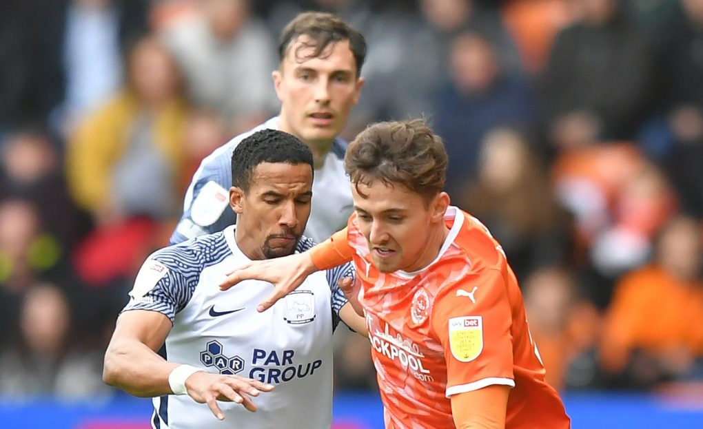 BLACKPOOL, ENGLAND - OCTOBER 23: Preston North End's Scott Sinclair battles with Blackpool's Ryan Wintle during the Sky Bet Championship match between Blackpool and Preston North End at Bloomfield Road on October 23, 2021 in Blackpool, England. (Photo by Dave Howarth - CameraSport via Getty Images)                                                                                                                           