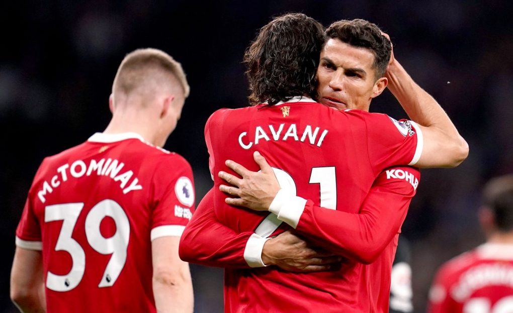Cristiano Ronaldo embraces Edinson Cavani after Man Utd's second goal